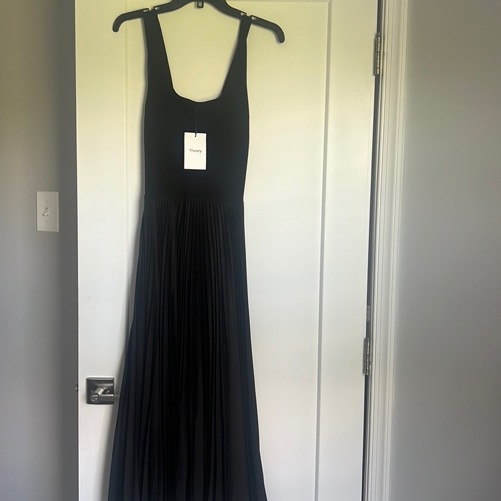 Beautiful long black sleeveless dress by Theory. Never worn!